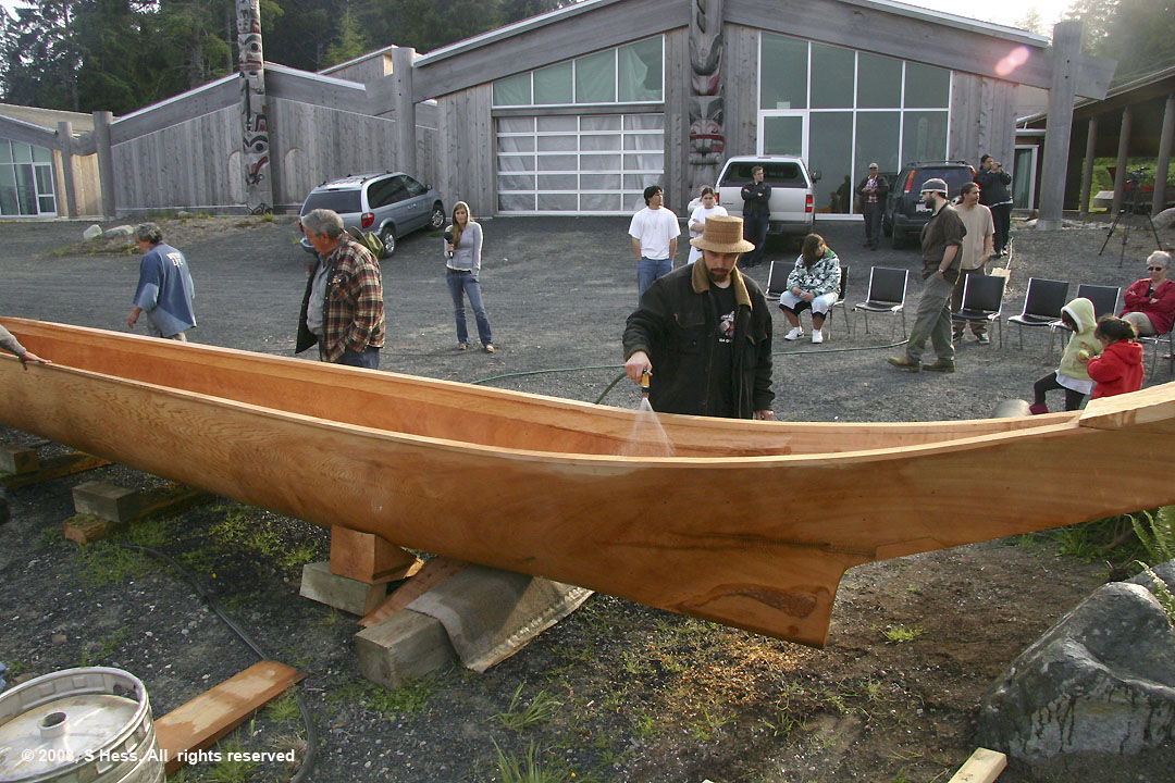 Canoe being sprayed with water